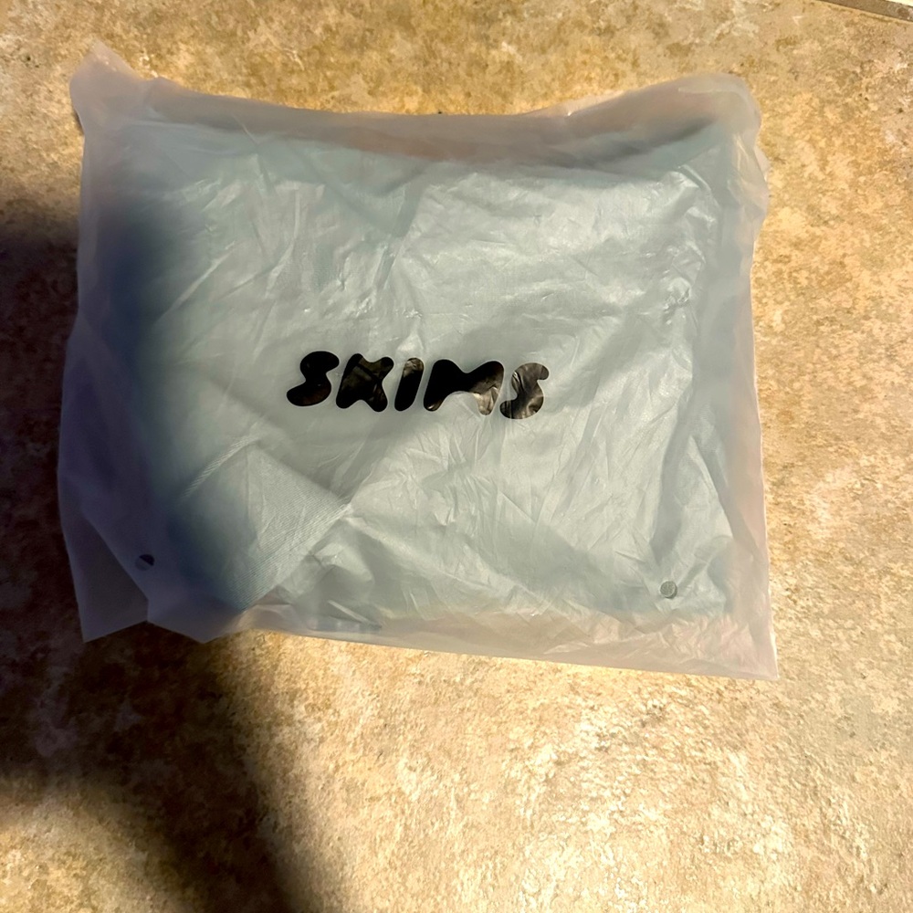 Brand NEW skims long sleeve shirt